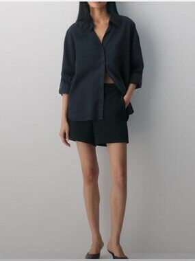 Aritzia High-Waist Tailored Black Shorts.